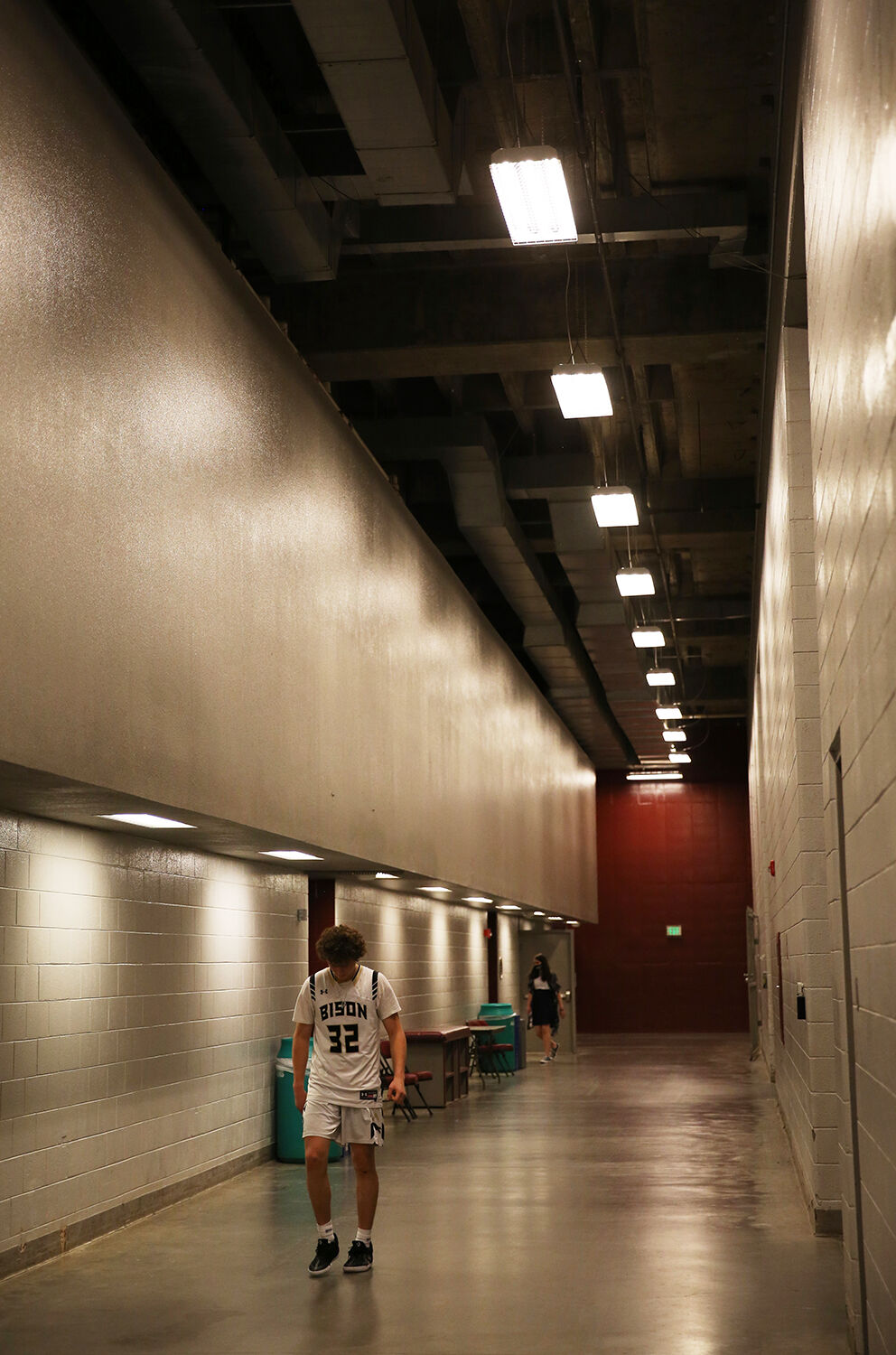 Calvin Rule wanders out of the locker room